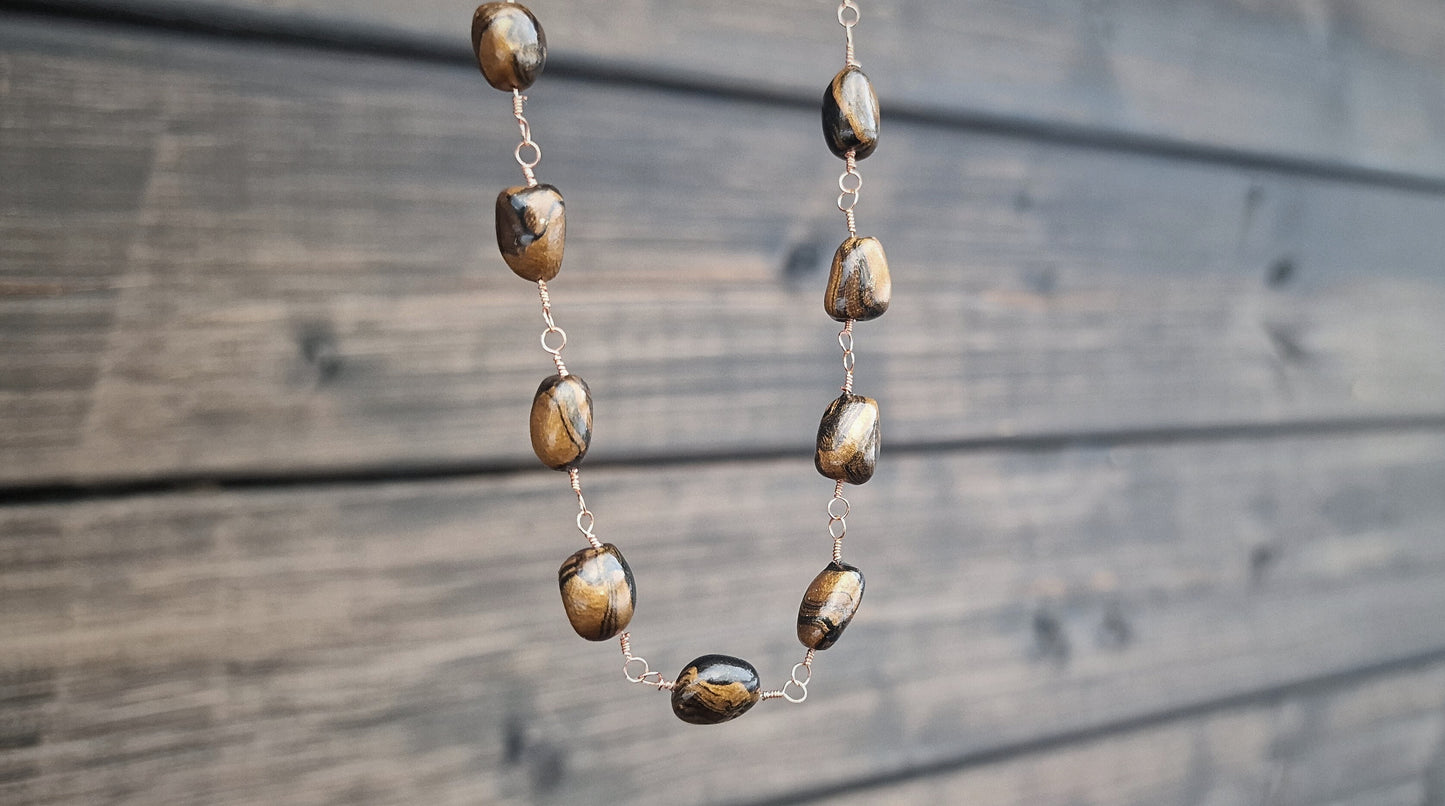 Perlekjedei lekre mørke farger