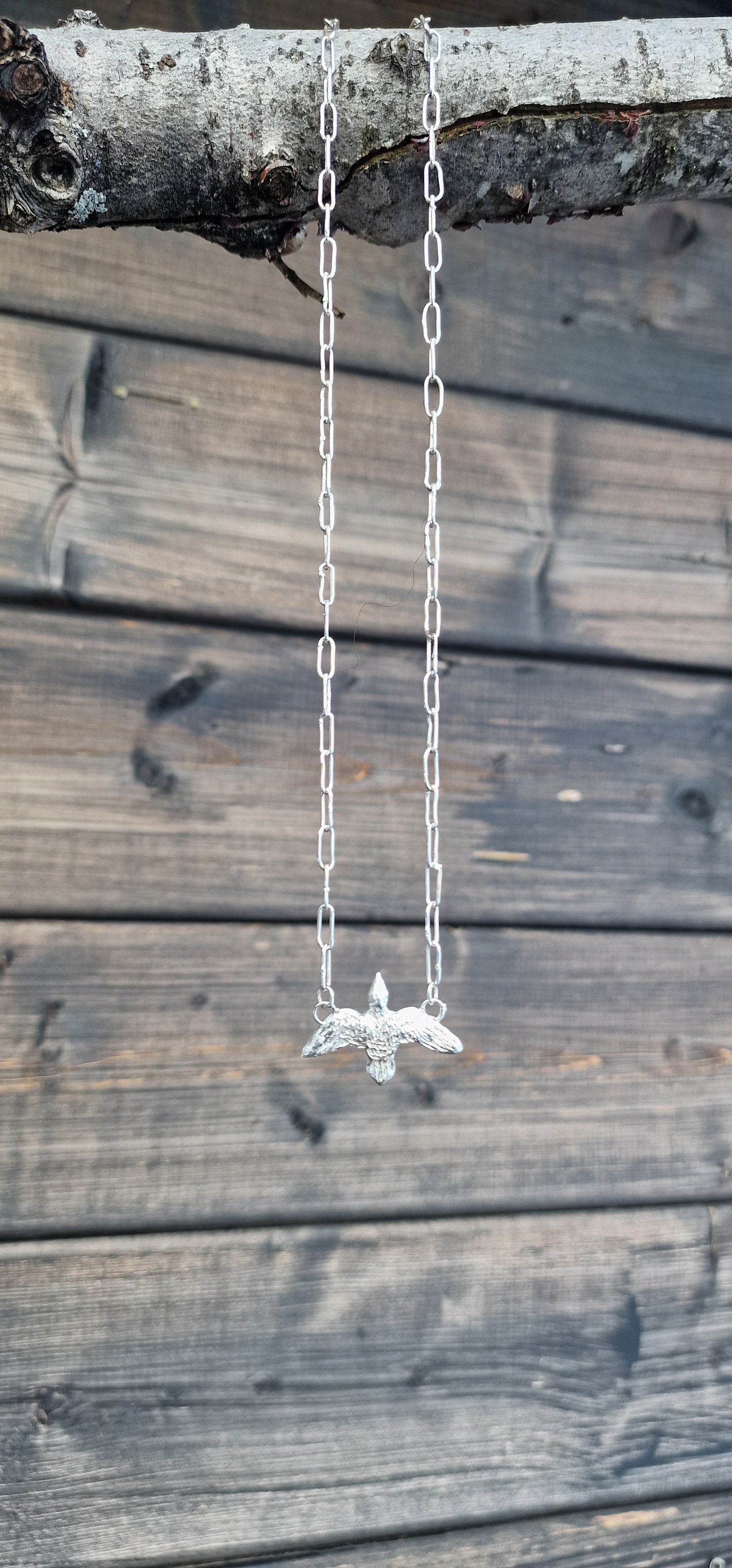 "Fri som fuglen" smykke i sølv